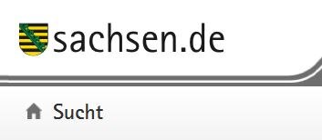 weißer Untergrund mit der Schrift sachsen.de und Sucht